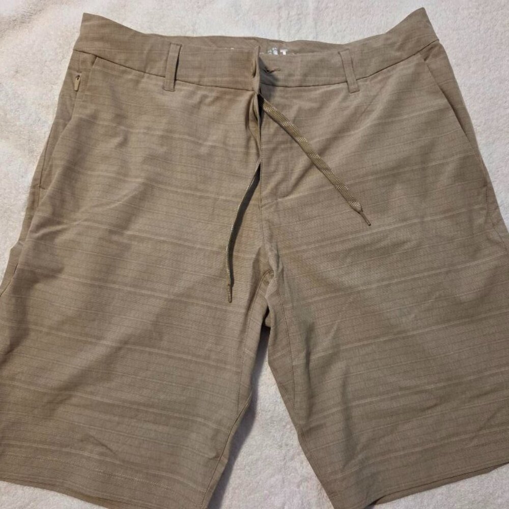Brand new khaki colored shorts with 5 pockets, mens 34 waist